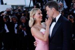Scarlett Johansson and Colin Jost couldn’t look more in love as Asteroid City star caresses husband’s face on Cannes red carpet
