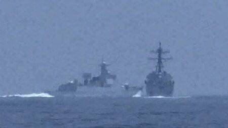 Moment Chinese warship nearly collides with US destroyer in Taiwan Strait