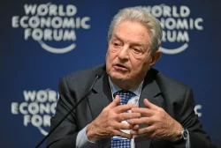 George Soros hands reins of bn empire to son Alex