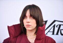 Billie Eilish flashes chest tattoo she swore fans would never see while sunbathing in bikini