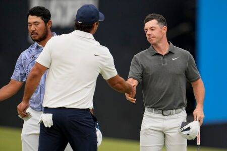 Rory McIlroy shakes hands with Brooks Koepka ahead of record-breaking US Open first round