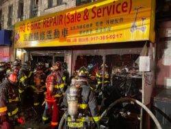 Fire at e-bike repair shop kills four after spreading to apartments