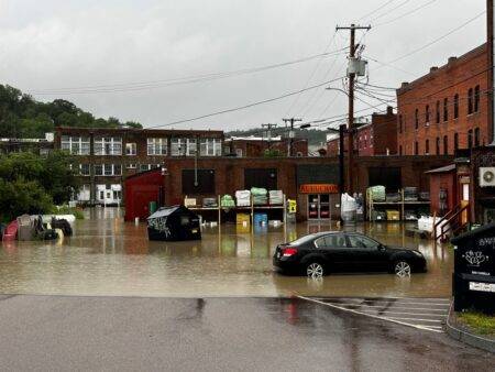 Terrifying moment floodwaters turn roads into rivers in Vermont