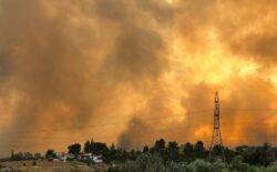 Fire crews lose control of huge wildfire in Greece as new heatwave looms
