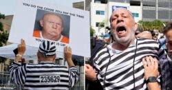 Protester in prisoner outfit holds bald Donald Trump ‘mugshot’ after charging his motorcade