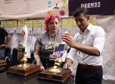 Rishi Sunak heckled for hiking price of alcohol as he tries to pull a pint