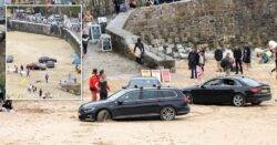 Locals perplexed after four cars get stuck on beach at the same time