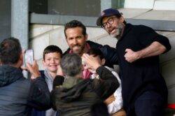 Hugh Jackman joins Ryan Reynolds at Wrexham FC match as Deadpool postponed due to strikes