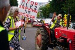 Anti-Ulez protest with tractors and three-wheel car brings traffic to standstill
