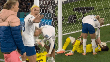 England players console distraught Nigeria goalkeeper and block cameraman from filming her