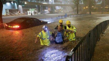 Hong Kong and southern China battle widespread flooding from record rains