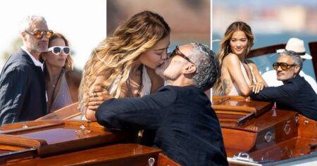 Rita Ora passionately kisses husband Taika Waititi while whizzing around Venice on a boat