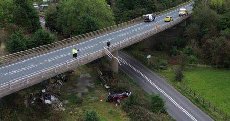 Man and woman die after car plunges off bridge during Storm Babet