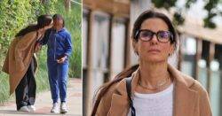 Forlorn Sandra Bullock holds hands with daughter in first sighting since partner Bryan Randall’s death