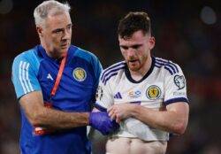 Liverpool suffer Andy Robertson injury scare as defender is forced off with Scotland