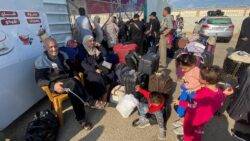 Crowds at Gaza crossing as some injured and foreign nationals likely to leave
