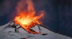 Mount Etna sprays fire and molten rock into the night sky in spectacular new eruption