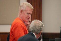 Ex-lawyer who killed wife and son smirks as he gets plea deal for 101 financial crimes