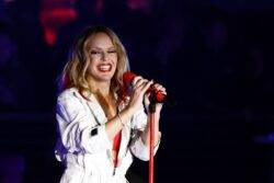 Kylie Minogue overwhelmed as couple gets engaged at her show in full-circle moment