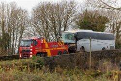 School pupils and teachers among injured in crash between bus and lorry