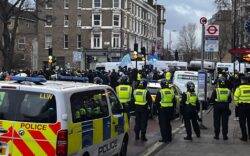 Eritrean protesters attack riot cops with sticks in south London