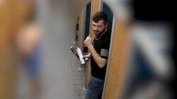 Changing room creep caught on camera trying to film girl in water park cubicle