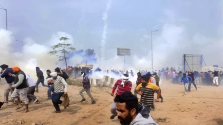 India police fire tear gas at protesting farmers on Delhi march