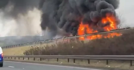 Motorway closed in both directions after lorry bursts into flames