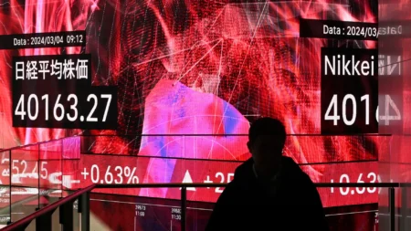 Shares drop in US and Asia as AI stocks slide