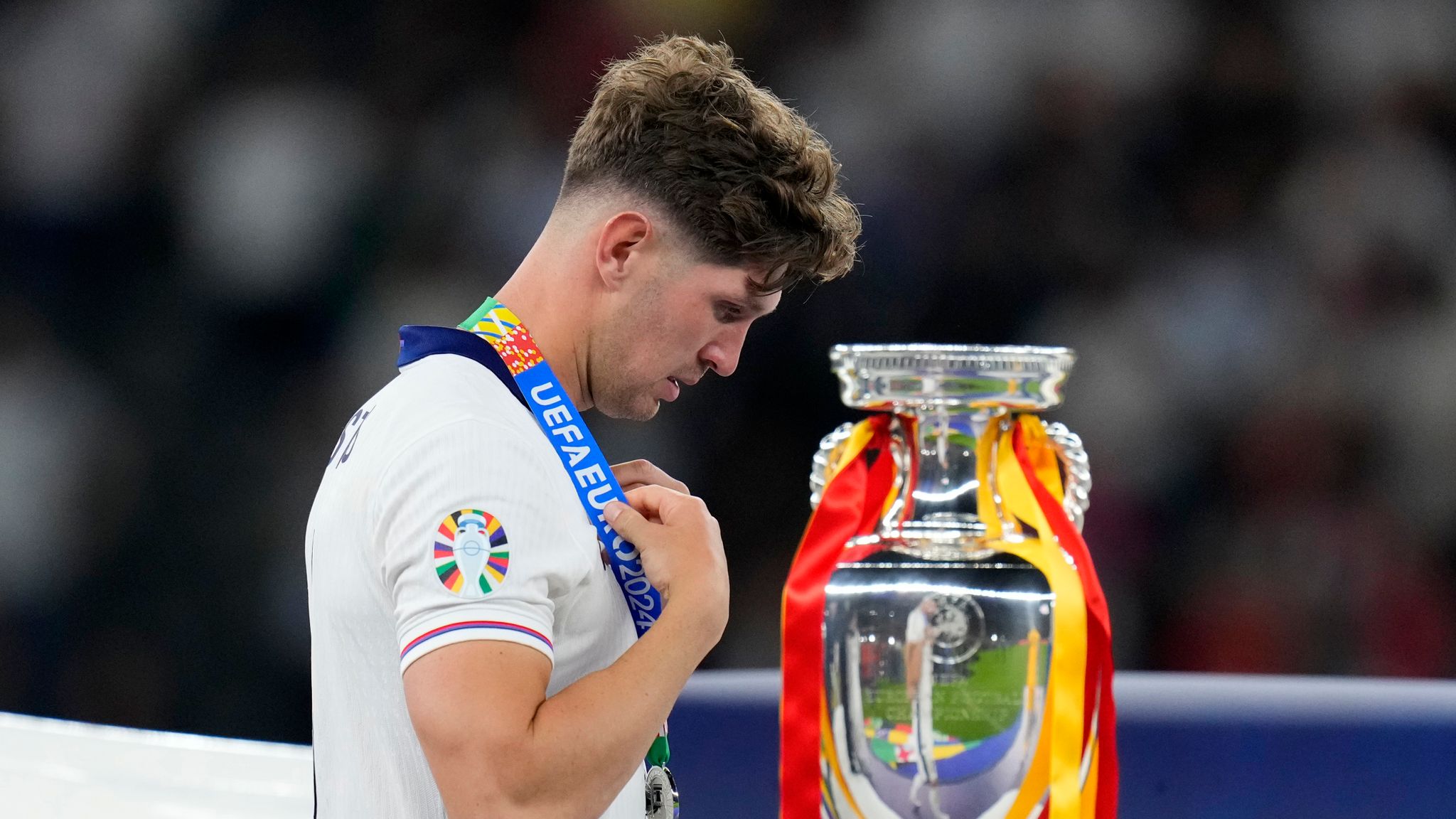 Englands John Stones walks past the trophy - WTX News Breaking News, fashion & Culture from around the World - Daily News Briefings -Finance, Business, Politics & Sports News
