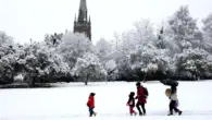 UK weather: snow and ice warning as commuters face widespread disruption