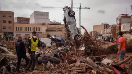 Barcelona hit by new flood as search for bodies in Valencia continues 