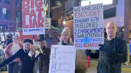 Anti-Trump protesters picket in Michigan during Trump rally