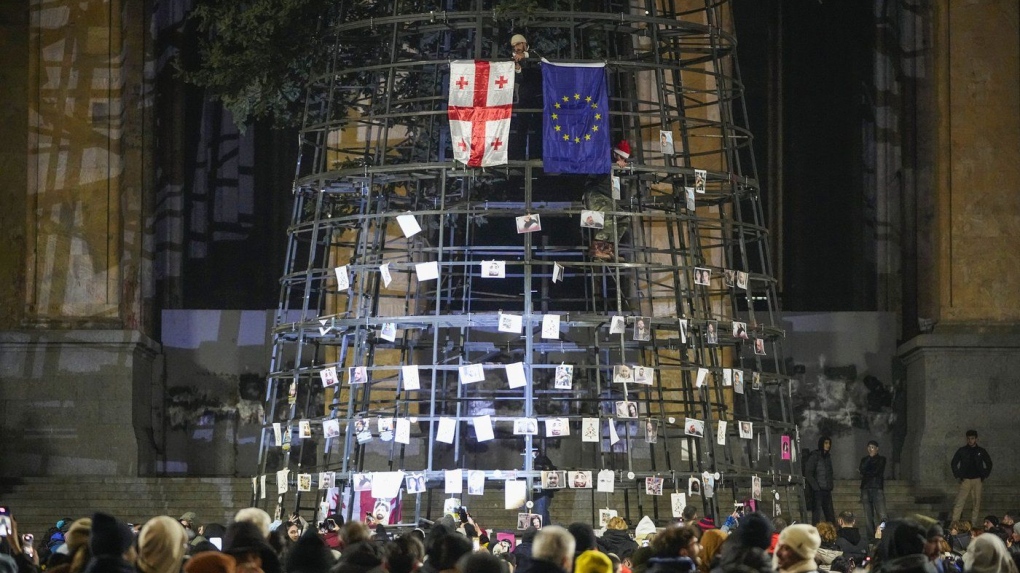 Georgian journalists allege brutal beatings as protests rage against ending EU talks