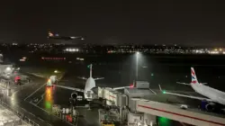 A plane lands at Heathrow Terminal 5 in London