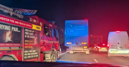 M61 traffic updates as motorway closed due to coach fire