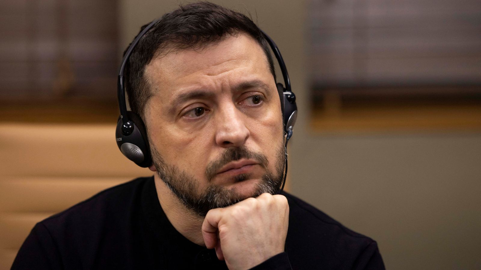 Ukrainian President Volodymyr Zelenskyy listens questions during a meeting with members of the media on the outskirts of London, Britain, March 2, 2025. REUTERS/Carlos Jasso