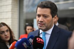 Portugal’s center right wins but far right snaps at heels