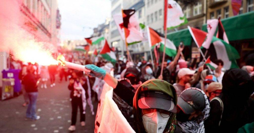 Pro-Palestine protesters gather in Basel with flares and smeared blood ahead of Eurovision final