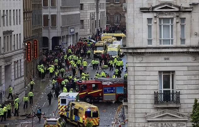 Liverpool's trophy parade horror as car 'collides' with crowd of fans after thousands flock in to celebrate Premier League title success