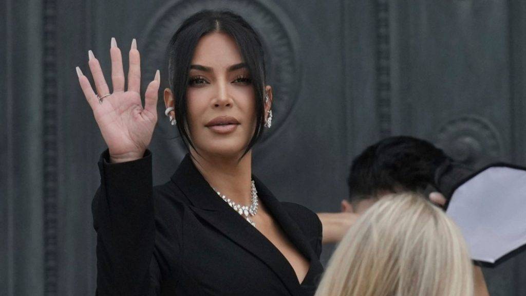 Kim Kardashian arrives at court to confront her alleged attackers in Paris robbery trial