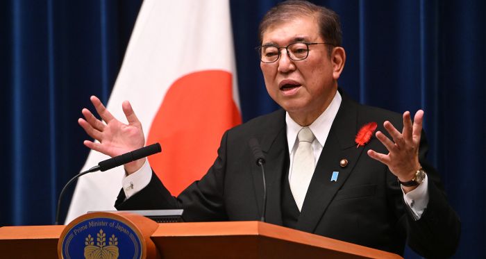 Japan's Ishiba vows to stay on after election defeat