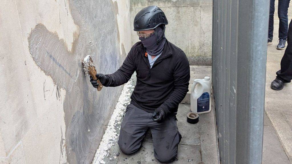 New Banksy artwork being removed from Royal Courts of Justice wall in London