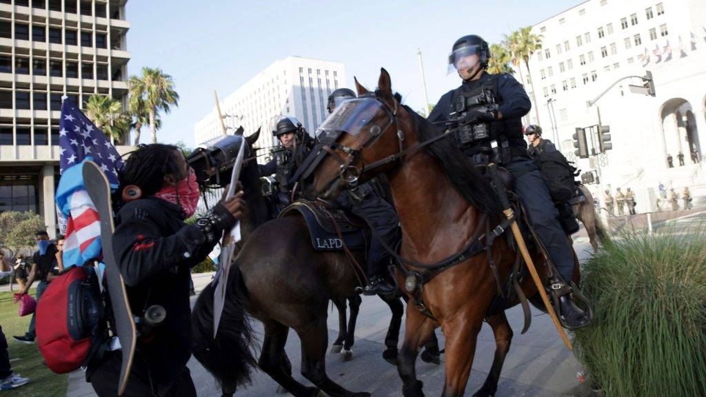 Trump suffers setback in bid to act as national police chief after chaos on streets of LA