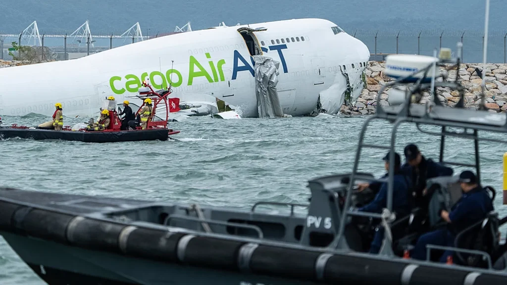 Two die as cargo plane skids off Hong Kong runway into sea