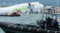 Two die as cargo plane skids off Hong Kong runway into sea