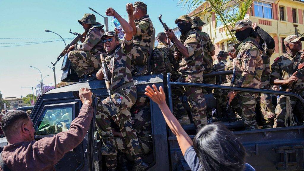 Madagascar president says coup under way as soldiers join protesters Madagascar president says coup under way as soldiers join protesters
