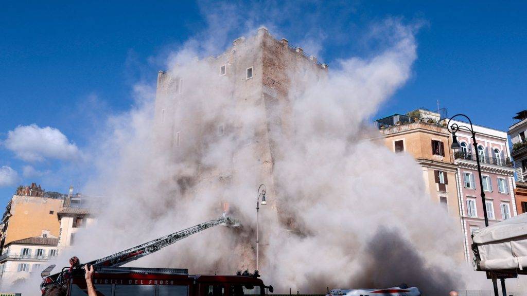 Worker trapped after medieval tower collapses during renovation work in Rome Worker trapped after medieval tower collapses during renovation work in Rome