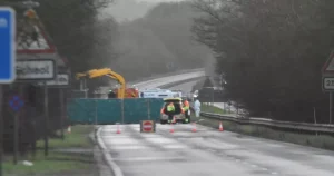 Three killed after BMW swerves off A46 with woman arrested