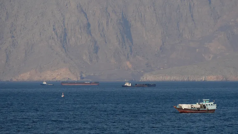 Ships and tankers in the Strait of Hormuz off the coast of Musandam, Oman, April 18, 2026. REUTERS/Stringer REFILE - QUALITY REPEAT TPX IMAGES OF THE DAY